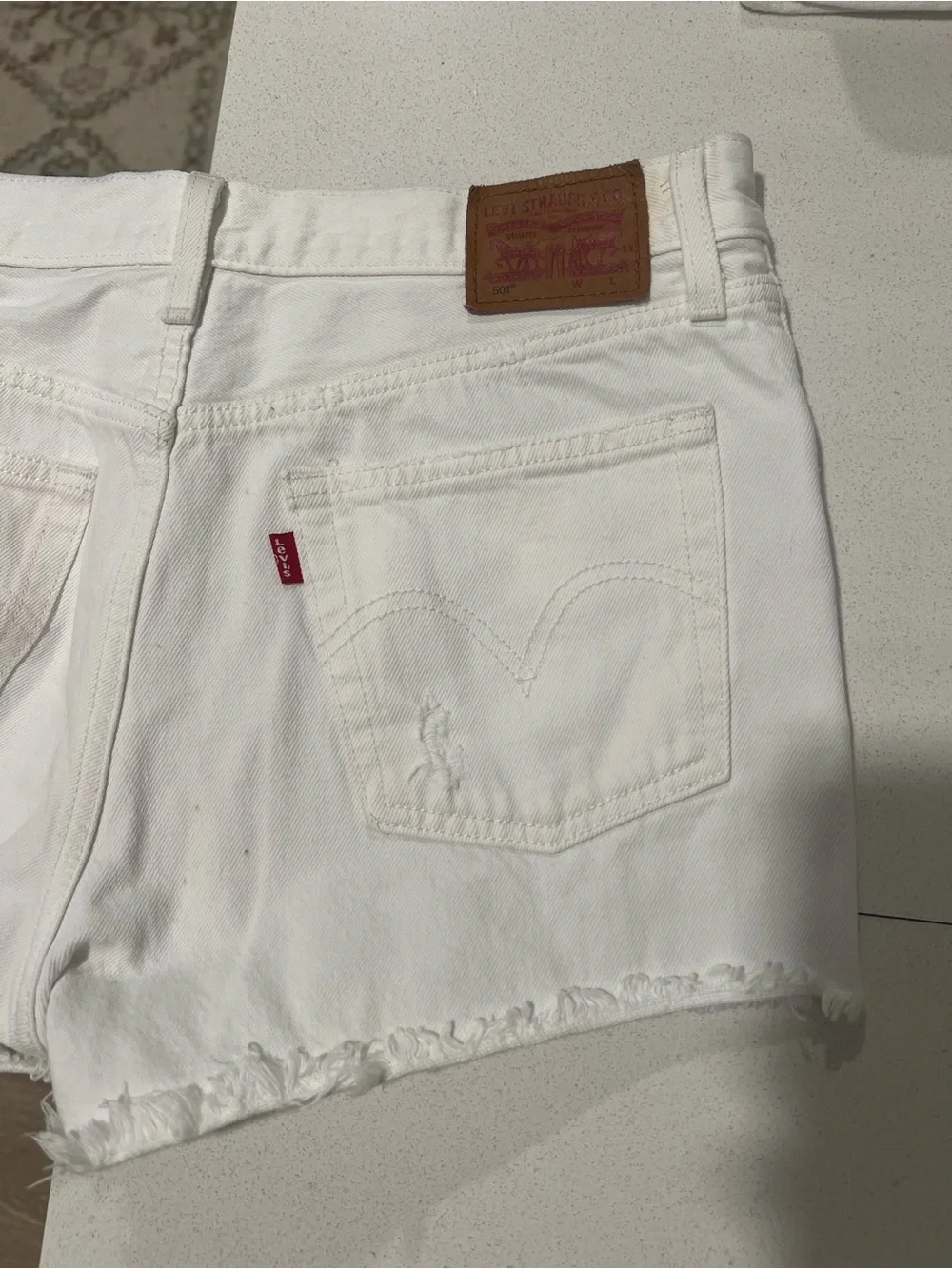 White Distressed Levi’s Shorts